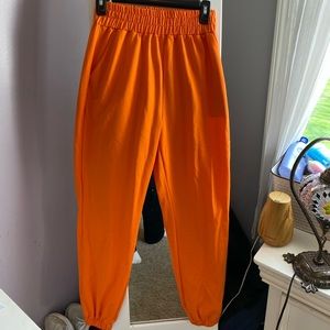 Women’s orange sweatpants